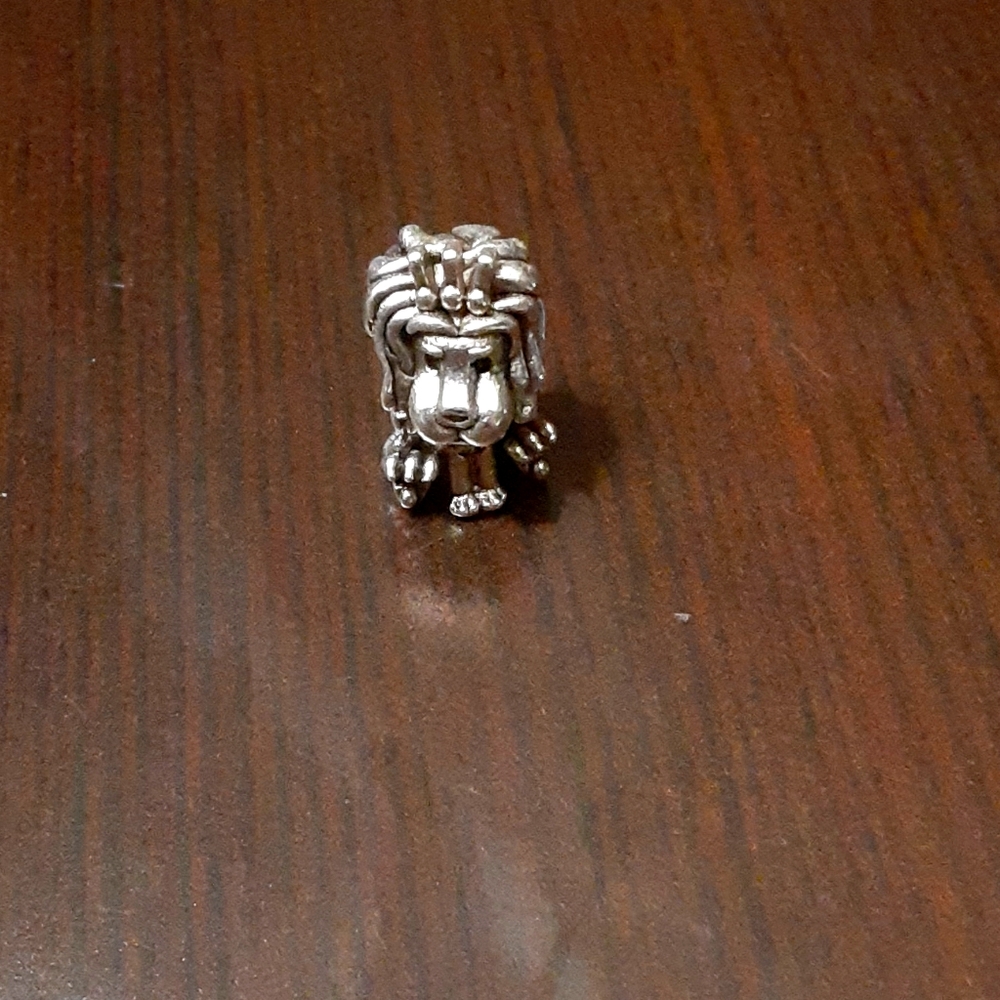 Silver lion charm